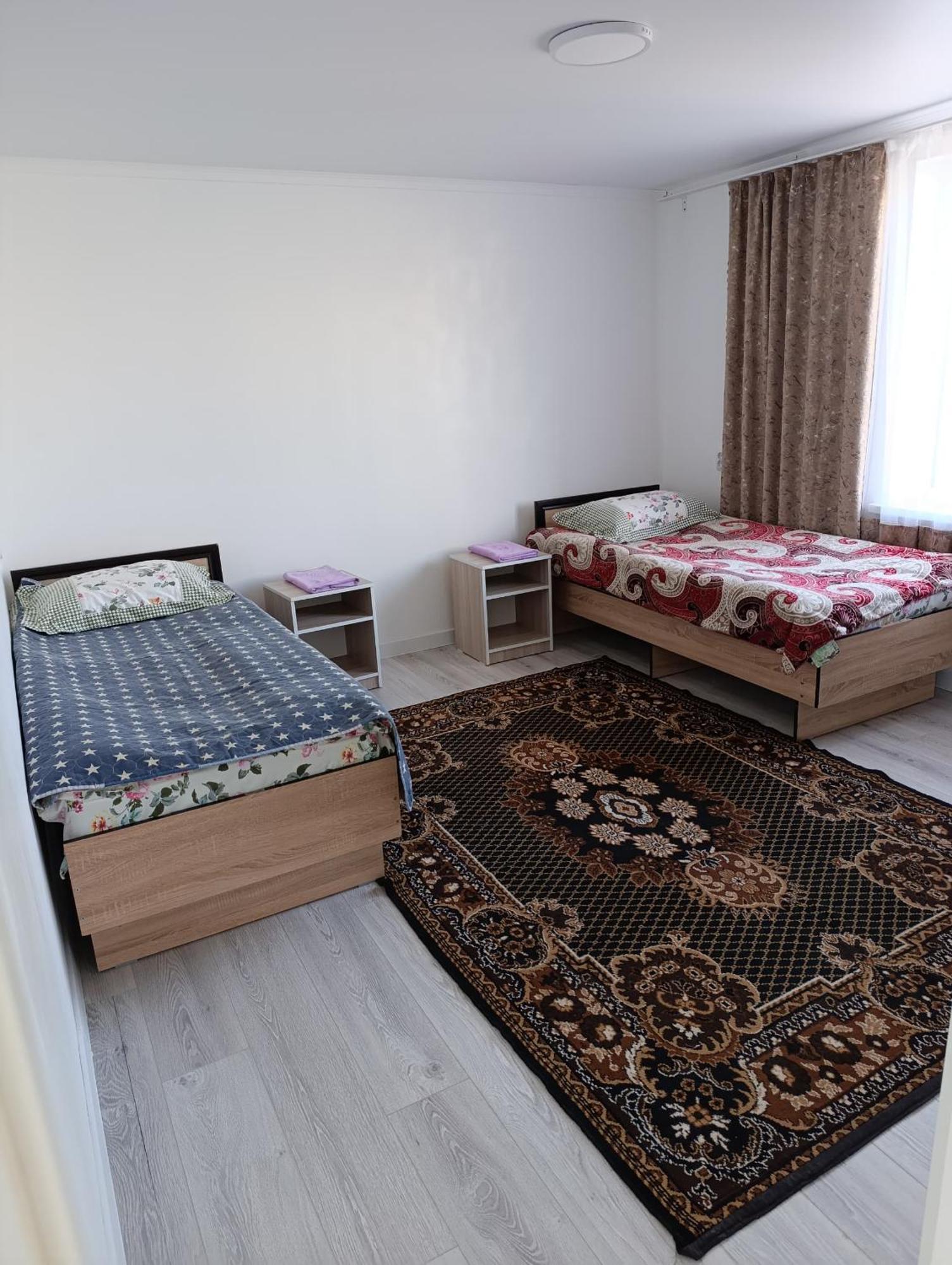 Center Guesthouse Kochkor Екстер'єр фото